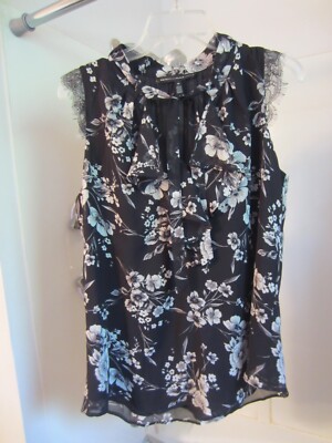 NWOT women's sleeveless blouse WhiteHouseBlackMarket Size 10 black/floral