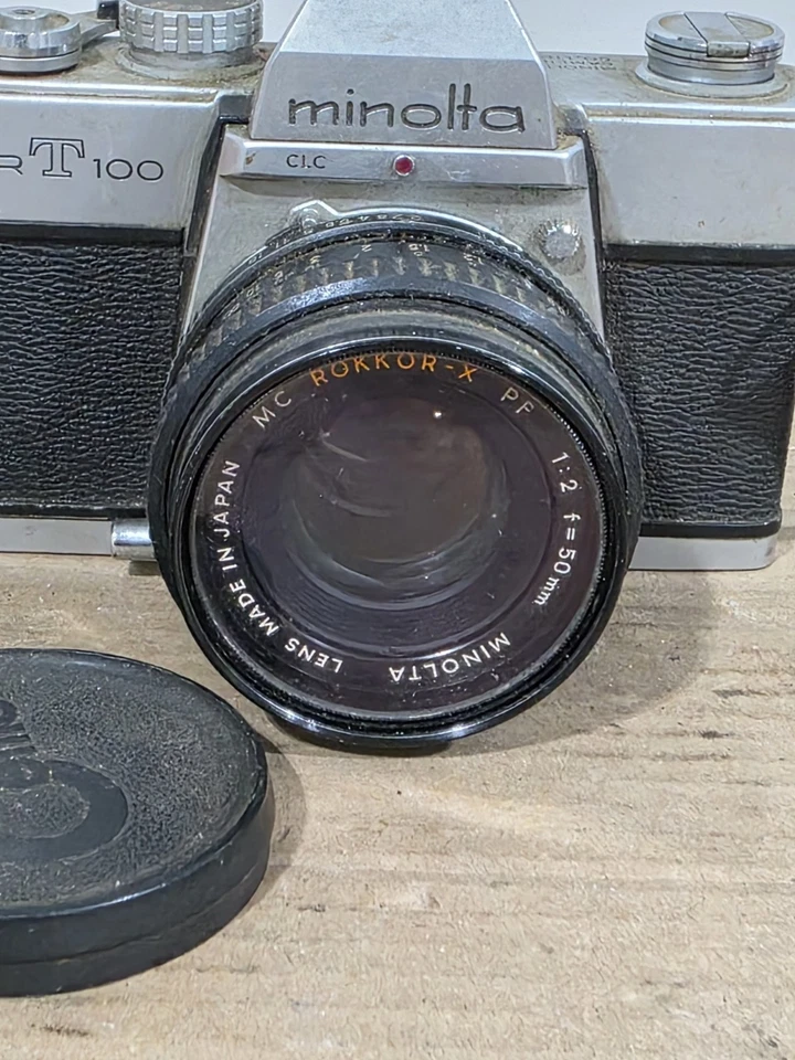 Cámara fotográfica Minolta SRT 100 con lente MC Rokkor-PF 1:2 f=50 mm buen estado de funcionamiento Foto 2 de 4