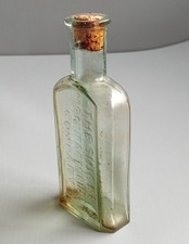 The Singer Manufacturing Company Extra Quality Machine Oil Glass Bottle Antique
