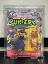 1988 TMNT Teenage Mutant Ninja Turtles SHREDDER 10-Back MOC w  Case   Playmates