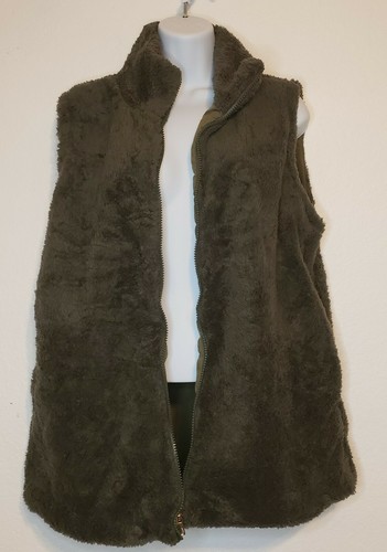green fuzzy vest