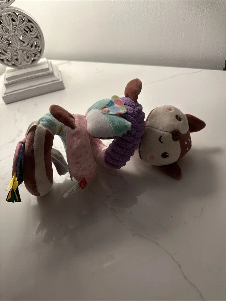 Accesorio espiral para cochecito de juguete para bebé Foto 2 de 4