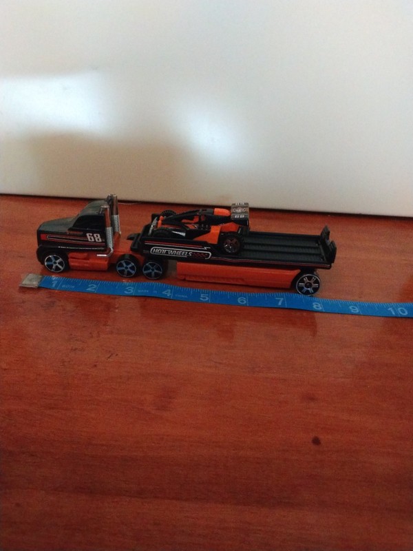Hot Wheel Big Rig Flat Bed, 2002, With Race Car 1991. Pre-owned