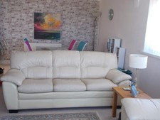 furniture village  two stone coloured  leather settees in outstanding condition