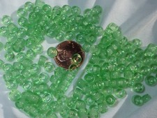 150 Spring Green transparent 4x6mm roller / crow pony Czech pressed glass beads