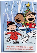 Peanuts Christmas card featuring the Peanuts gang-opens to 3 folds