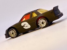 MATCHBOX??Premium 1990 CHEVROLET LUMINA MATT BLACK - HTF AMBER GLASS??