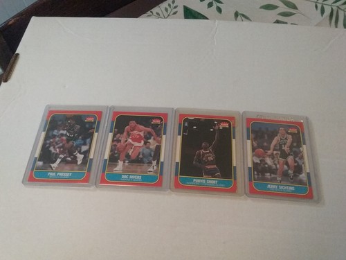 LOT OF 4 1986 FLEER BASKETBALL CARDS PRESSEY 88 RIVERS 91 SHORT 100 SICHTING 101