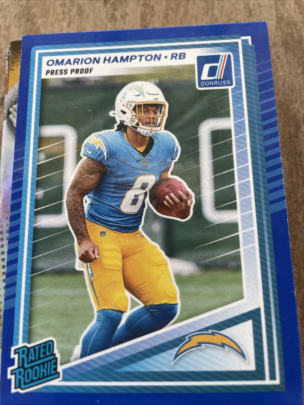 2025 Panini Donruss Omarion Hampton Rated Rookie Blue Press Proof