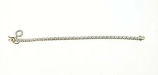 BEAUTIFUL STERLING SILVER & YELLOW GOLD TENNIS BRACELET WITH CHARM DETAIL