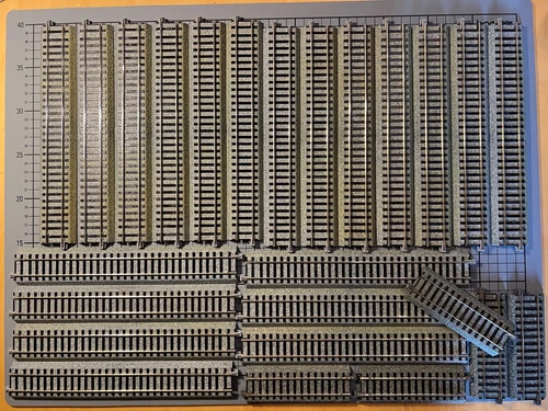 Konvolut KATO Unitrack-Gleise H0, 20x S246, 5x S114