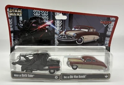 Disney Pixar Cars Star Wars Mater als Darth Vader und Doc als Obi Wan Kenobi selten - Bild 1 von 4