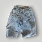 Light blue high-rise vintage Lee mom jeans with back pocket and brown leather Lee badge on waistband, made in USA.