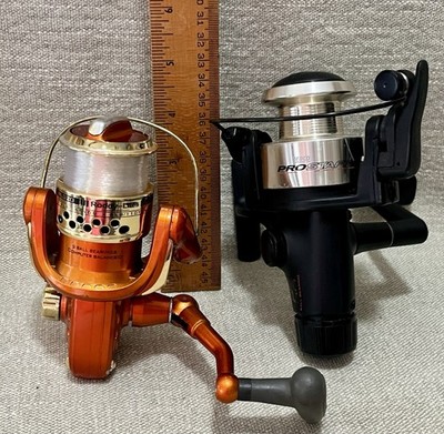 2 Fishing Spinning Reels Roddy Lites RLG20 Metallic Orange Zebco