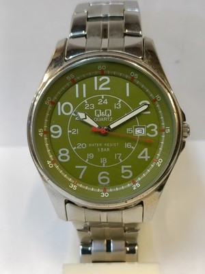 Q&Q QUARTZ GREEN DIAL JAPAN MOV'T MEN'S WORKING CONDITION