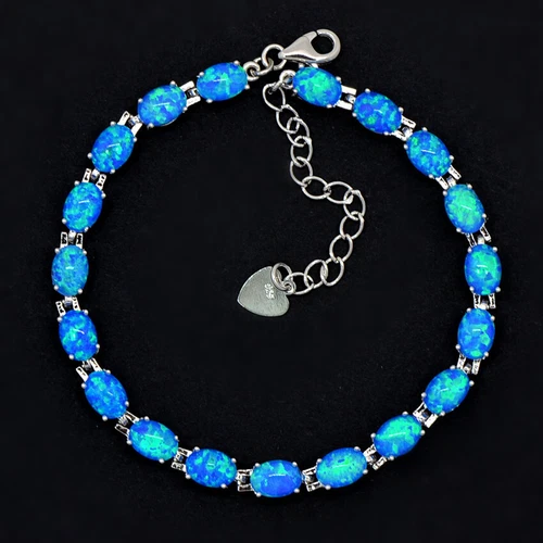 UK New Sterling Silver Dipped Oval White Fire Opal Tennis Bracelet - Picture 4 of 25
