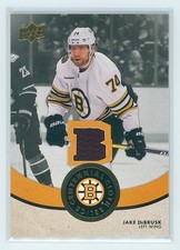 2023-24 Upper Deck Boston Bruins Centennial Cloth Relics #CCR-JD Jake DeBrusk