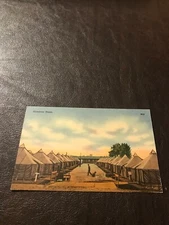 MILITARY -UNPOSTED POSTCARD - COMPANY STREET - ARMY LIFE  IN TENTS......SLOT 114