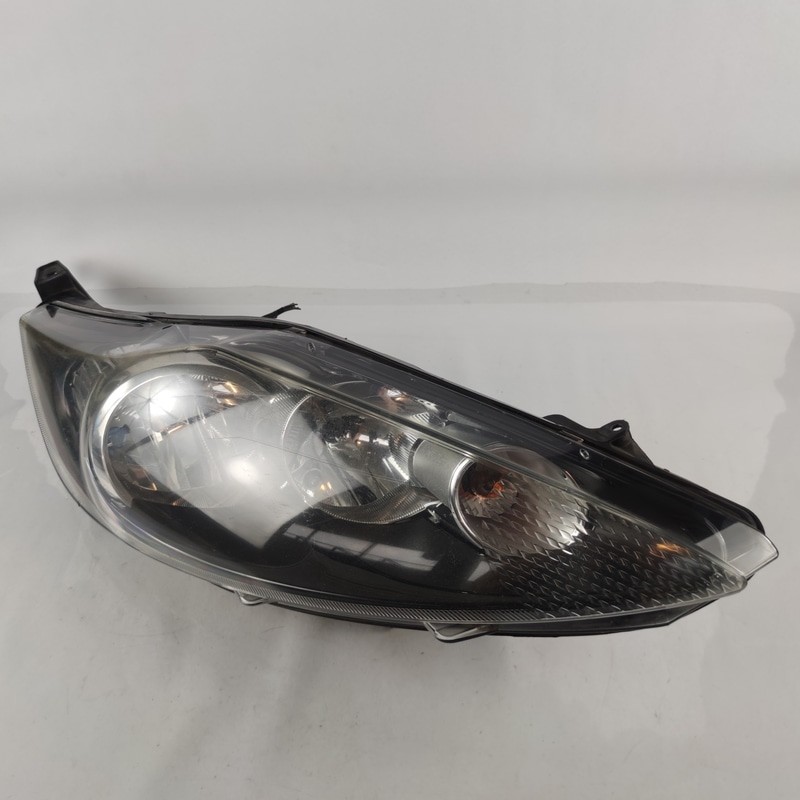 1734613 Proiettore DX FORD FIESTA (CB1) 1.4 16V (71Kw) Ber. 3p/b-g/1388cc