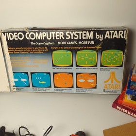 Atari CX-2600 Console Bundle Complete in box w 10 CIB games working 1980