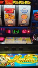 Authentic Japanese Paschillo machine. Tokens And Quarters