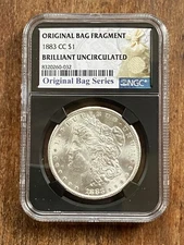 1883 CC Morgan Silver Dollar Original Bag Fragment NGC Brilliant Uncirculated SP