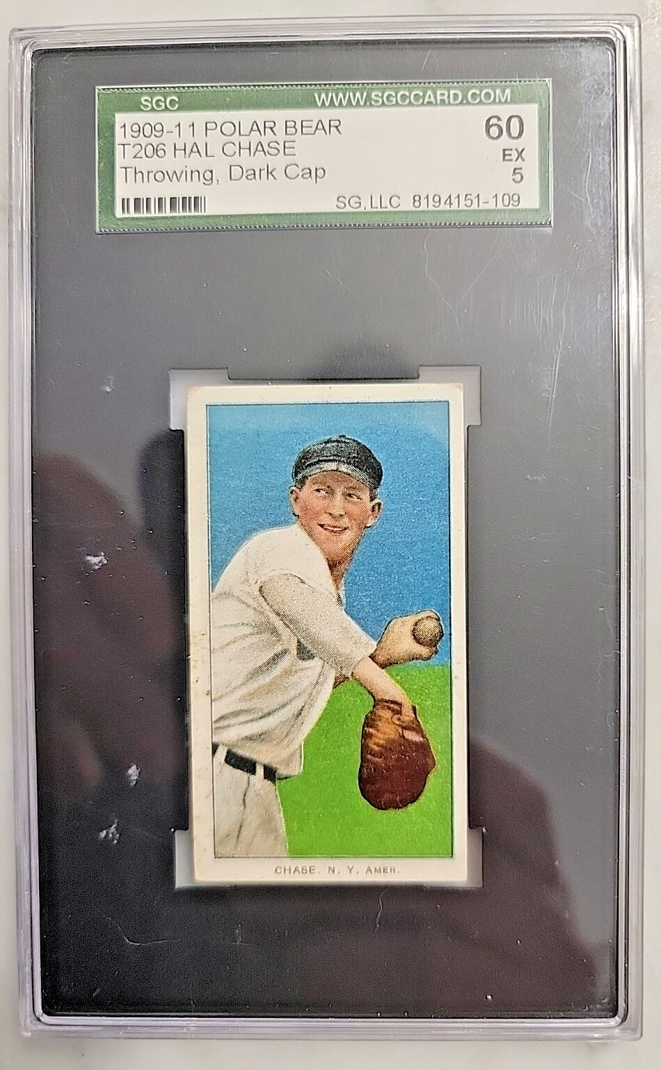 1909-1911 T206 Polar Bear Hal Chase Throwing Dark Cap SGC Grade EX 60/5
