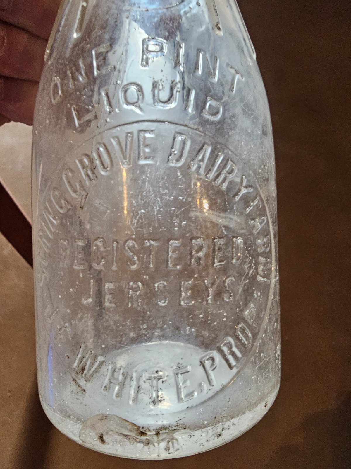 Milk Bottle Embossed SPRING GROVE DAIRY FARM ONE PINT LIQUID