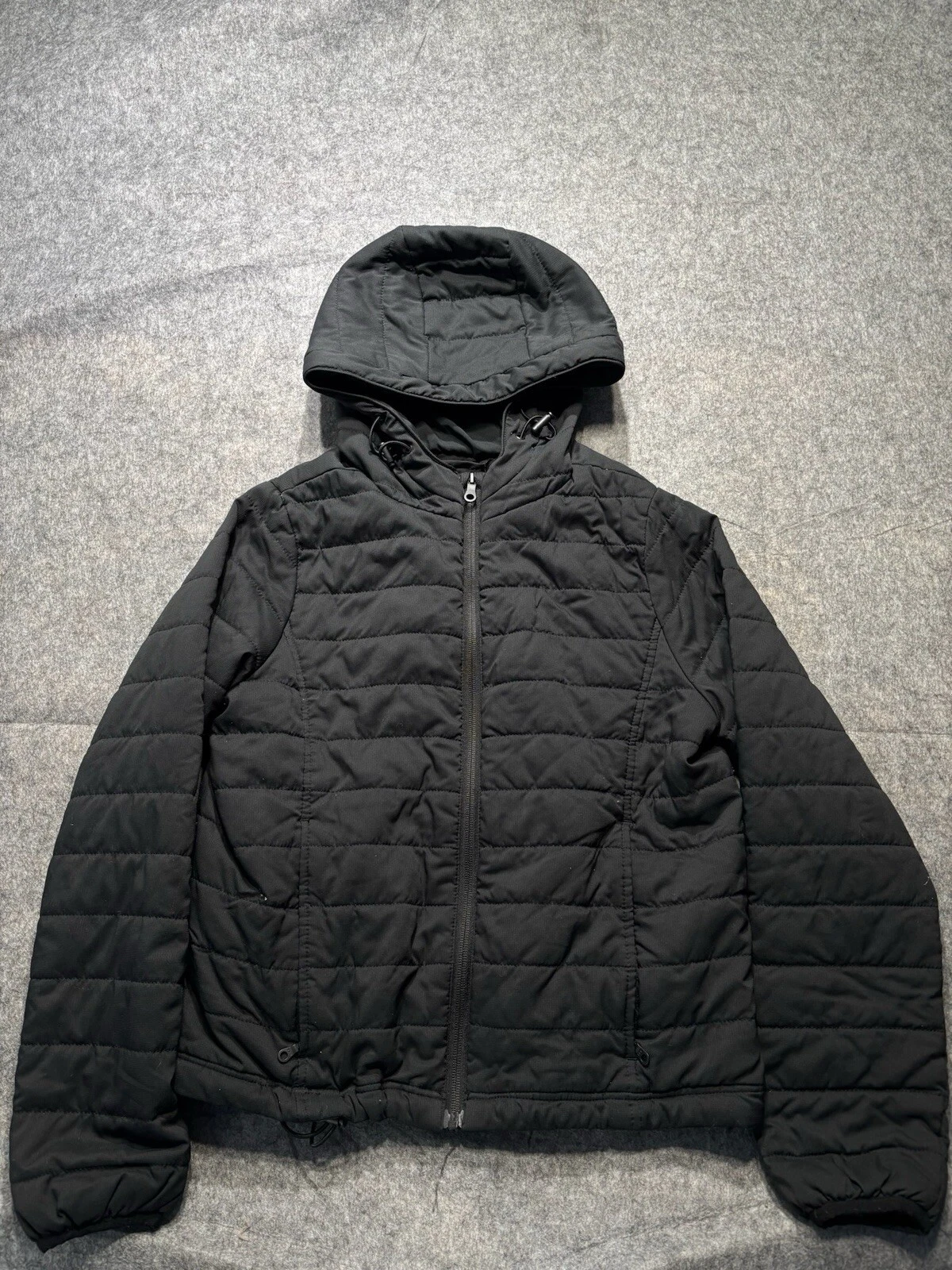 girlfriend-collective packable hooded puffer jacket