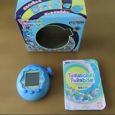 BANDAI Tamagotchi PaRaDiSe Blue Water Virtual Pet with Manual and Guide