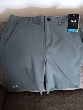 NWT UNDER ARMOUR YOUTH BOYS GRAY SHORTS SIZE 18, BRAND NEW WITH TAGS UA,,LOOK