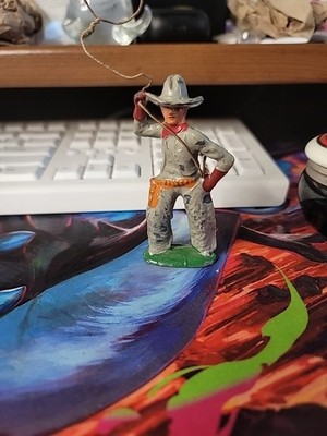 Vintage Metal Cowboy Figure with Lasso Western Toy