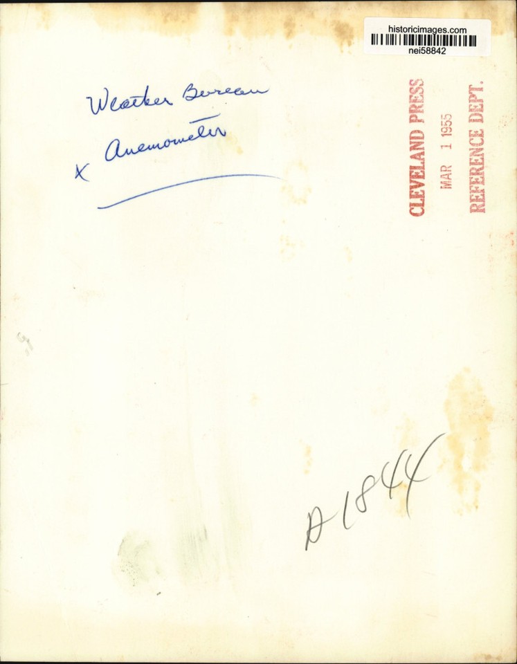 1955 Press Photo Gordan Dunn of Weather Bureau holds anemometer in