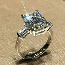 4 Ct Emerald Cut Moissanite Three-Stone Engagement Ring 14K White Gold Plated