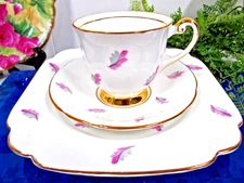Clarence tea cup and saucer trio painted feather design pattern teacup England