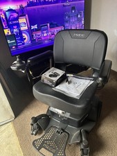 Pride Mobility Power Chair Excellent Condition - Includes charger manual.