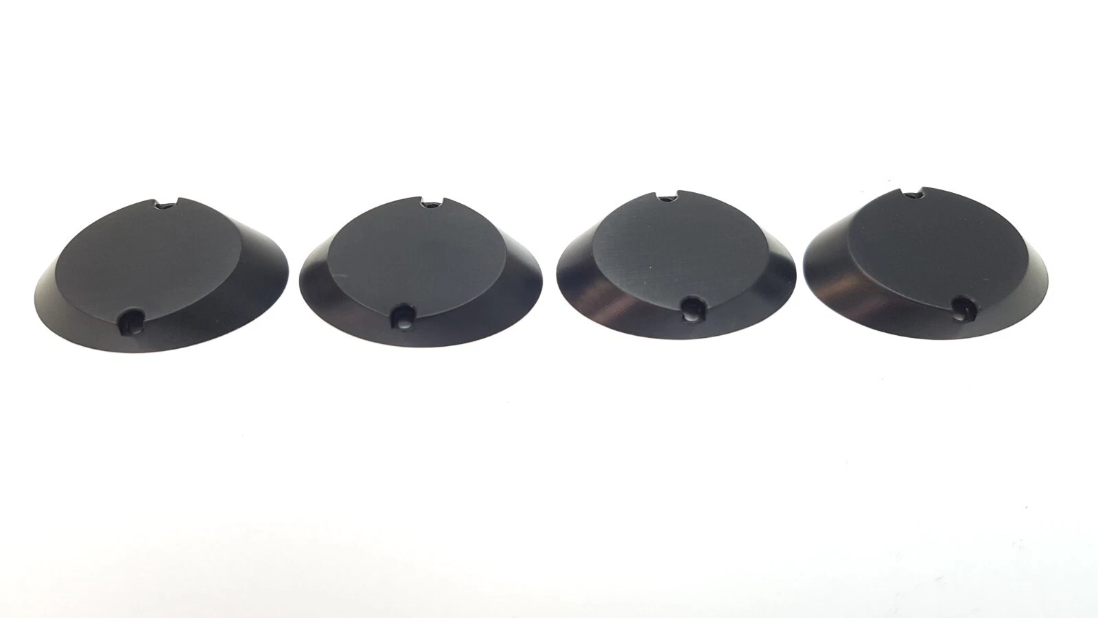 Four Lumenis MM-1099640 covers side by side, showing the bevelled edge