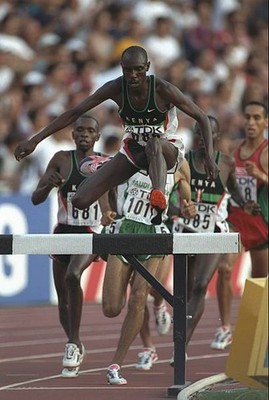 Moses Kiptanui of Kenya leaps a barrier 3 000 metre steeple chase - Old Photo