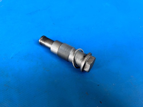 Timing belt chain tensioner