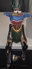 Hand Carved Hand Painted Jointed Wood Sitting COW Figurine Vintage