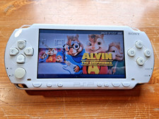 Sony White PSP 1003. c/w Memory, Original Charger, Game. Tested. V.G.C.