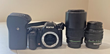 Pentax K-5 Camera w/ multiple lenses, travel bag, and extra handle