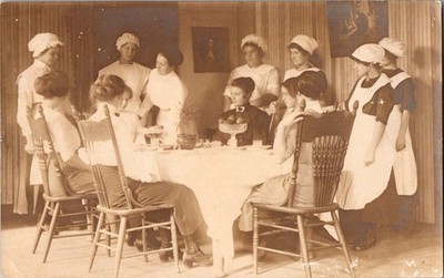 Postcard RPPC Ladies Seated ''Domestic Science Lesson'' Staff Around Table 1910's