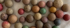50 Vintage Clay Marbles Various Sizes and Colors.
