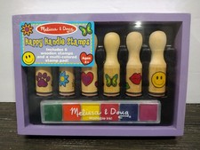 Melissa  Doug Happy Handles Wooden Stamp Set: 6 Stamps and 6-Color Stamp Pad