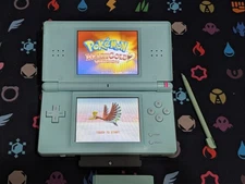 Nintendo DS Lite Teal w/ Charger, Stylus, & 2 Random Games - A028