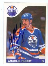 Charlie Huddy autographed Hockey Card (Oilers) 1985 O Pee Chee hockey card #187
