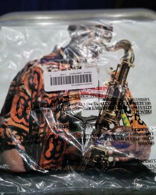 supreme saxophone tee