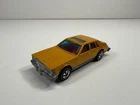 Hot Wheels Cadillac Seville 1:64 Diecast Car Hong Kong Vintage 1980 Gold/Yellow
