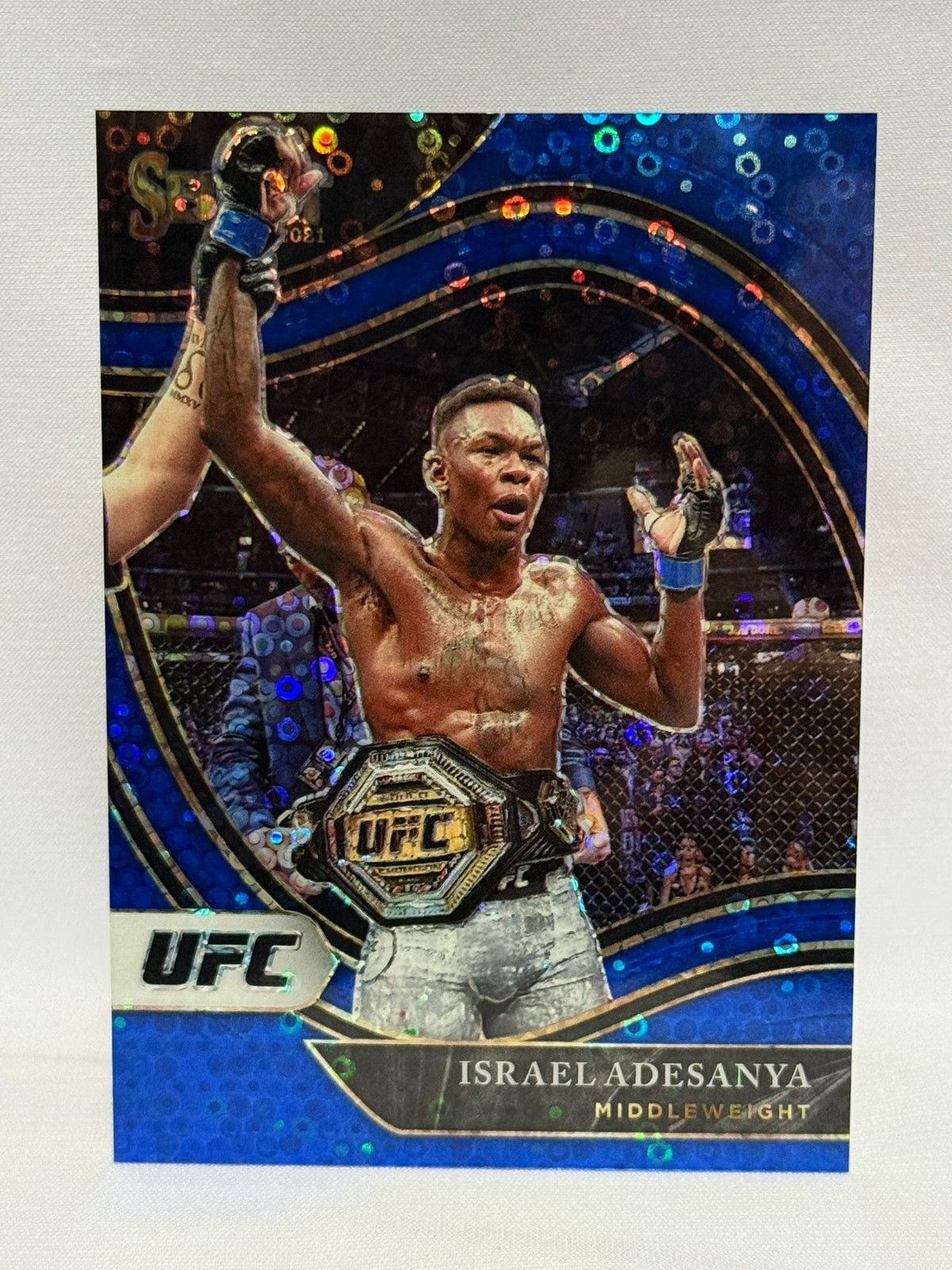 2021 Select UFC Israel Adesanya #134 Octagonside BLUE Disco Prizm 79/99